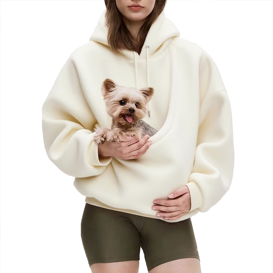 Ivory pet pouch hoodie, with a small dog in the pouch